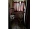 Bathroom with a window, toilet, and sink in disrepair, showing signs of wear and needing updates at 1581 Se Woodland Se Cir, Atlanta, GA 30316