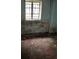 Interior shot of a room showing damaged walls and flooring at 1581 Se Woodland Se Cir, Atlanta, GA 30316