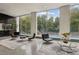 Bright lobby area with expansive windows overlooking the pool at 215 Piedmont Ne Ave # 2103, Atlanta, GA 30308