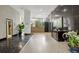 Inviting lobby area featuring tiled floors, planters, and reception desk at 215 Piedmont Ne Ave # 2103, Atlanta, GA 30308