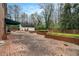 Brick patio includes an outdoor kitchen, bricked-in planters and lots of space at 3074 Cascade Sw Rd, Atlanta, GA 30311