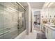 Clean bathroom featuring tile floors, a glass shower door, and classic fixtures at 3074 Cascade Sw Rd, Atlanta, GA 30311