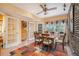 Sunny breakfast nook with tiled floors, a ceiling fan, and access to the backyard at 3074 Cascade Sw Rd, Atlanta, GA 30311