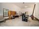Spacious garage perfect for storage, with exposed stud walls and bright windows at 3074 Cascade Sw Rd, Atlanta, GA 30311