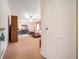 Main bedroom with carpet and a view to the en suite bathroom at 3074 Cascade Sw Rd, Atlanta, GA 30311