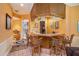 A vintage wet bar with barstool seating and storage for glasses at 3074 Cascade Sw Rd, Atlanta, GA 30311