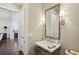 Bright bathroom features marble countertop and floors, modern fixtures and stylish lighting at 55 Church St, Alpharetta, GA 30009