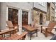 Charming patio featuring comfortable seating and natural tones, ideal for relaxing and entertaining at 55 Church St, Alpharetta, GA 30009