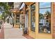 Charming storefront with custom hat displays, perfect for browsing and finding unique accessories at 55 Church St, Alpharetta, GA 30009