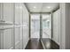 Bright walk-in closet with ample storage and mirrored doors leading to the en suite bathroom at 55 Church St, Alpharetta, GA 30009
