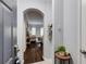 Charming arched entryway with hardwood floors and a view into the living room at 5641 Roswell Rd # 307, Sandy Springs, GA 30342