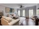 Inviting living room filled with natural light, featuring stylish decor and hardwood floors at 5641 Roswell Rd # 307, Sandy Springs, GA 30342
