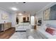 Open living room featuring hardwood floors and an open view to the kitchen at 5641 Roswell Rd # 307, Sandy Springs, GA 30342