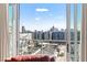 Balcony view showcasing the city skyline and vibrant urban surroundings from the condo at 1100 Howell Mill Nw Rd # 613, Atlanta, GA 30318