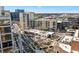 Beautiful city view of a condominium neighborhood, featuring upscale homes, walkable paths, and commercial storefronts at 1100 Howell Mill Nw Rd # 613, Atlanta, GA 30318