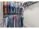 Walk-in closet featuring hanging rods, shelving, and ample storage space at 1100 Howell Mill Nw Rd # 613, Atlanta, GA 30318