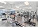 Bright fitness center with modern equipment and large windows overlooking the city at 1100 Howell Mill Nw Rd # 613, Atlanta, GA 30318