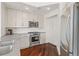 Updated kitchen showcases stainless steel appliances and ample white cabinetry at 1100 Howell Mill Nw Rd # 613, Atlanta, GA 30318