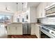 Bright kitchen with stainless steel appliances and views of the city at 1100 Howell Mill Nw Rd # 613, Atlanta, GA 30318