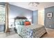 Comfortable bedroom with natural light and colorful quilt at 214 Ridley Howard Ct, Decatur, GA 30030