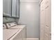 Functional laundry room with washer, dryer, and storage cabinets at 214 Ridley Howard Ct, Decatur, GA 30030
