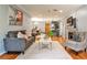 Cozy living room and dining area with hardwood floors, modern furnishings, and plenty of natural light at 214 Ridley Howard Ct, Decatur, GA 30030