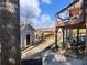 Backyard with a shed and a partially visible lake at 6041 Blackberry Ln, Buford, GA 30518