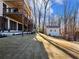 Expansive backyard featuring a two-story deck and a charming storage shed at 6041 Blackberry Ln, Buford, GA 30518