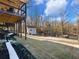 Expansive backyard features a well-maintained lawn and shed, providing ample space for outdoor activities at 6041 Blackberry Ln, Buford, GA 30518