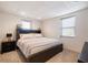 This bedroom has soft neutral colors and two windows for lots of natural light at 6041 Blackberry Ln, Buford, GA 30518