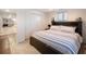 This bedroom offers a plush carpet and easy access to other areas of the basement at 6041 Blackberry Ln, Buford, GA 30518