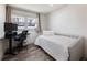 Cozy bedroom with a desk and chair offering a great work from home space at 6041 Blackberry Ln, Buford, GA 30518