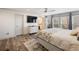 Main bedroom with hardwood floors, and ensuite bathroom at 6041 Blackberry Ln, Buford, GA 30518