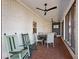 Covered patio with outdoor furniture offers a tranquil retreat for relaxation and enjoyment at 6041 Blackberry Ln, Buford, GA 30518