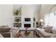 Bright and open living room with vaulted ceilings, comfortable sofas, and a decorative fireplace at 7445 Talbot Colony, Atlanta, GA 30328