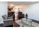 Open living space leading to kitchen, complete with stylish seating at 7445 Talbot Colony, Atlanta, GA 30328