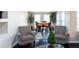 Cozy living room featuring a round table, chairs, and hardwood floors at 7445 Talbot Colony, Atlanta, GA 30328