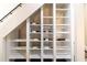 Under-stairs wine storage area with built-in shelving at 7445 Talbot Colony, Atlanta, GA 30328