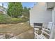 Backyard featuring a patio area with seating and landscaped yard at 2015 Kilmington Sq, Alpharetta, GA 30009