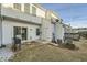 Private backyard featuring a patio area with seating, small lawn and storage at 2015 Kilmington Sq, Alpharetta, GA 30009