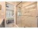 Bathroom with tile shower and glass door at 2015 Kilmington Sq, Alpharetta, GA 30009