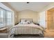 Bedroom with ceiling fan and lots of natural light at 2015 Kilmington Sq, Alpharetta, GA 30009