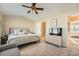 Bedroom with ceiling fan, TV, dresser and ensuite bathroom at 2015 Kilmington Sq, Alpharetta, GA 30009