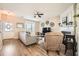 Inviting living room with hardwood floors, neutral paint, fireplace, and lots of natural light at 2015 Kilmington Sq, Alpharetta, GA 30009