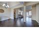 Dining area featuring stylish dark hardwood floors and ample natural light at 27 Spring Folly Nw, Cartersville, GA 30121