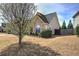 A well-maintained home with a brick facade and manicured landscaping creating a cozy curb appeal at 27 Spring Folly Nw, Cartersville, GA 30121