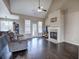 Comfortable living room with vaulted ceiling, fireplace, and expansive hardwood floors at 27 Spring Folly Nw, Cartersville, GA 30121