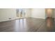 Bright living room featuring attractive hardwood floors and access to the outdoors at 4985 Crowe Se Dr, Smyrna, GA 30082