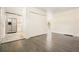 Open layout featuring hardwood floors that connect the living room to the kitchen at 4985 Crowe Se Dr, Smyrna, GA 30082