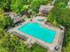 An aerial view shows the community pool with ample lounge seating at 5425 Edinbourgh Ct, Cumming, GA 30040